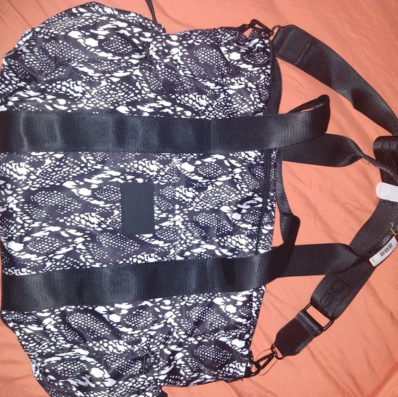 BEBE Sport Becca Large Duffel
Black/White Snake Pr - Picture 5 of 8